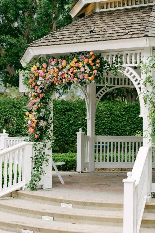 wedding ceremony, ceremony, ceremony floral, ceremony ecor, colorful floral, gazebo, altar, atlar area, disneyland, disneyland hotel, rose court, rose court garden