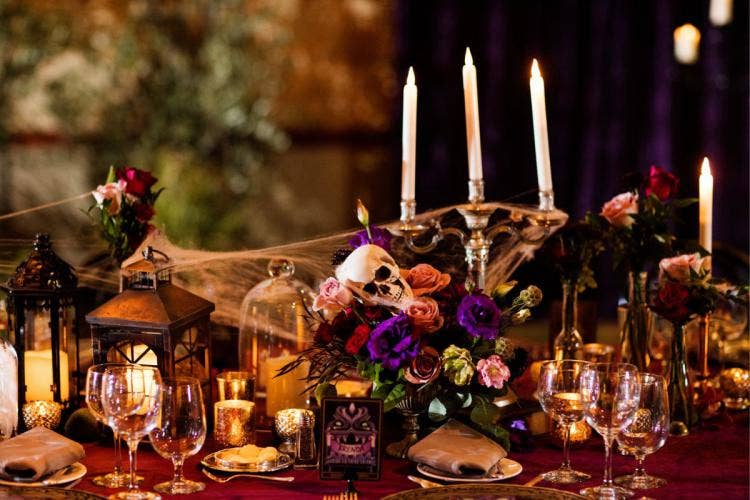 wedding reception, reception, decor, reception decor, table decor, candelabras, halloween, halloween theme, moody aesthetic, moody decor, webs, cobwebs