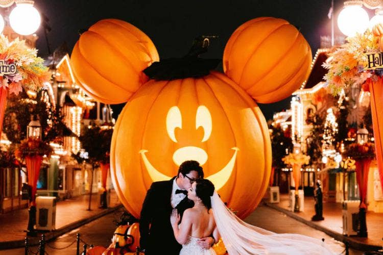 bride and groom, couple, portrait, couple portrait, disneyland, disneyland resort, mainstreet, halloween, mickey pumpkin