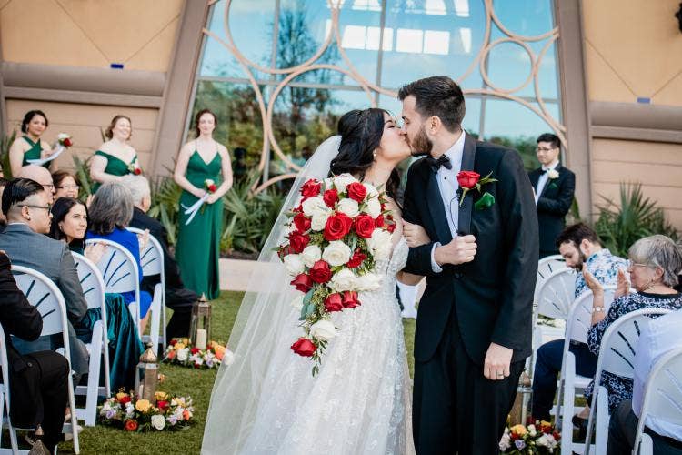 couple, exit, wedding ceremony, ceremony, ceremony exit, kiss, coronado springs, coronado, Destino plaza