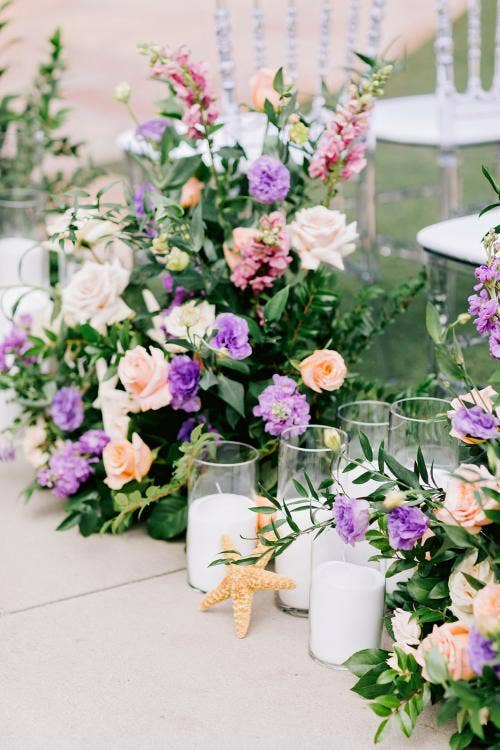 wedding ceremony, ceremony, aisle, aisle decor, aisle floral, boho floral, candles, aisle candles, Disneyland, Disneyland Hotel, rose court, rose court garden