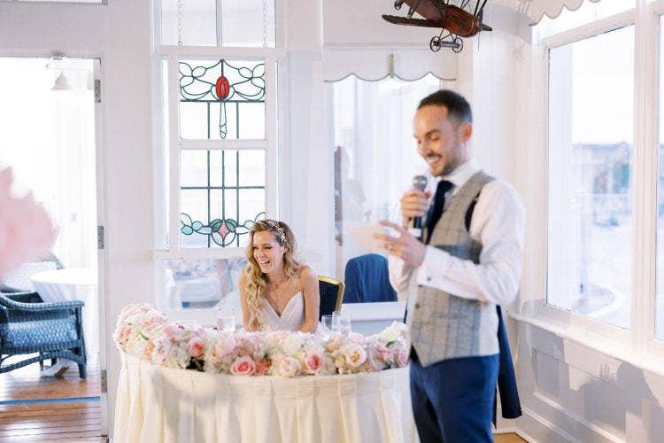 bride and groom, couple, wedding reception, reception, sweetheart table, boardwalk, the attic, pink floral, reception floral