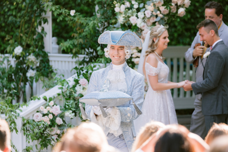 wedding ceremony, ceremony, major domo, glass slipper, cinderella glass slipper, entertainment, bride and groom, vows, rose court, rose court garden, disneyland, disneyland hotel