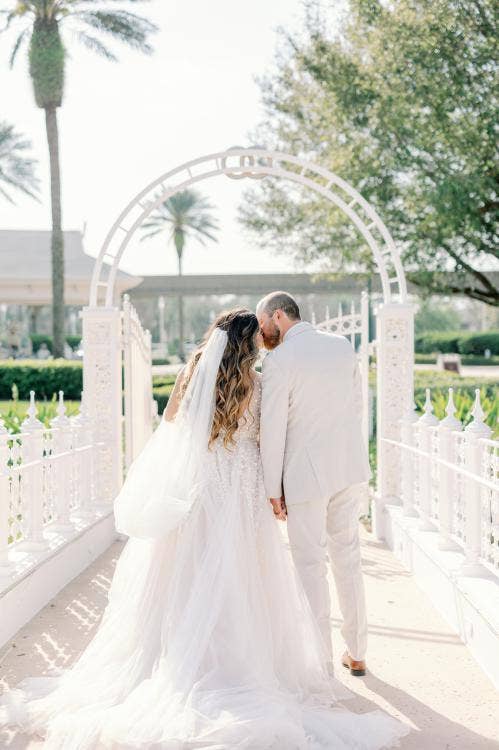 bride and groom, couple, portrait, couple portrait, bridge, disney's wedding pavilion
