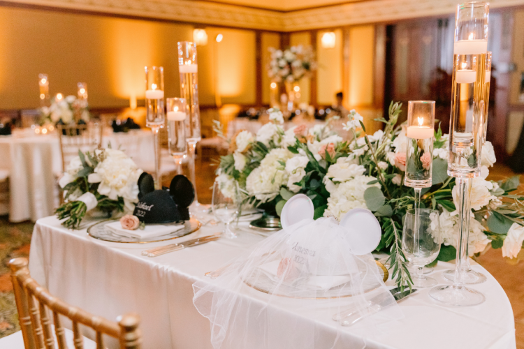 wedding reception, reception, reception decor, decor, sweetheart table, reception floral, floating candles, floral centerpieces, custom centerpieces, mickey hats, grand californian, grand californian ballrooms