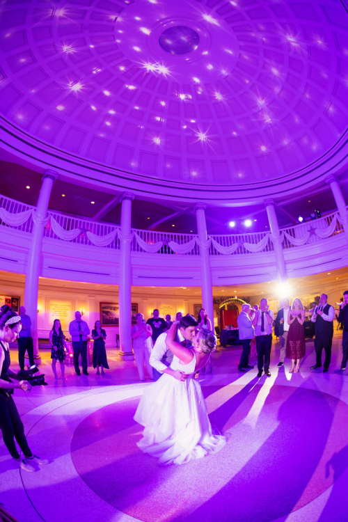 couple, first dance, dance, wedding reception, reception, Epcot, American adventure rotunda, custom up lighting, up lighting