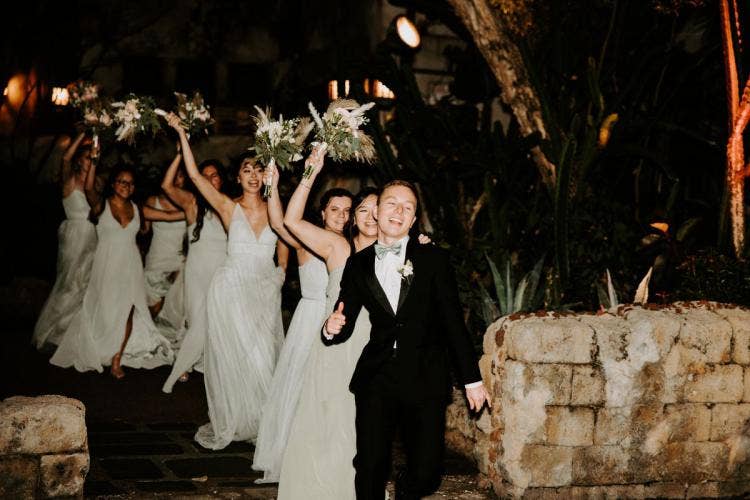 bridal party, wedding party, bridesmaids, groomsmen, entrance, reception entrance, wedding reception, reception, Disney's animal kingdom, animal kingdom, boho floral