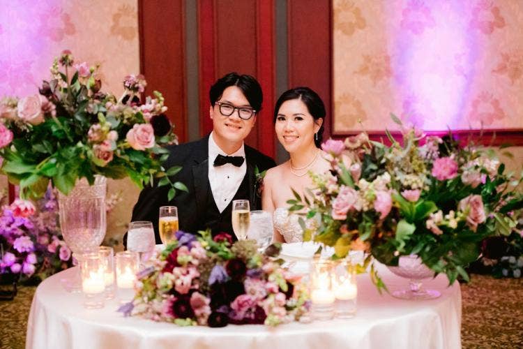 bride and groom, couple, wedding reception, reception, moody aesthetic, moody floral, custom up lighting, up lighting, purple up lighting, grand californian, grand californian ballroom