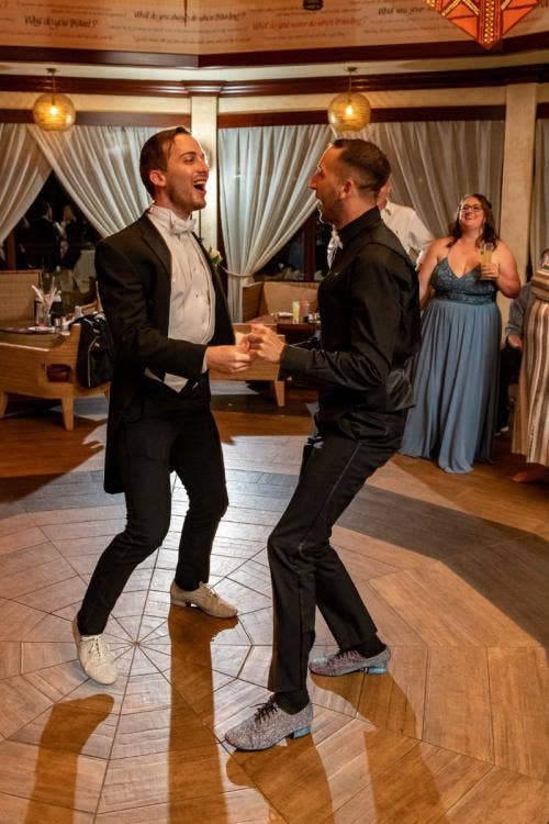 groom groom, lgbtq, lgbtq couple, first dance, dance, wedding reception, reception, disney's animal kingdom, animal kingdom, nomad lounge
