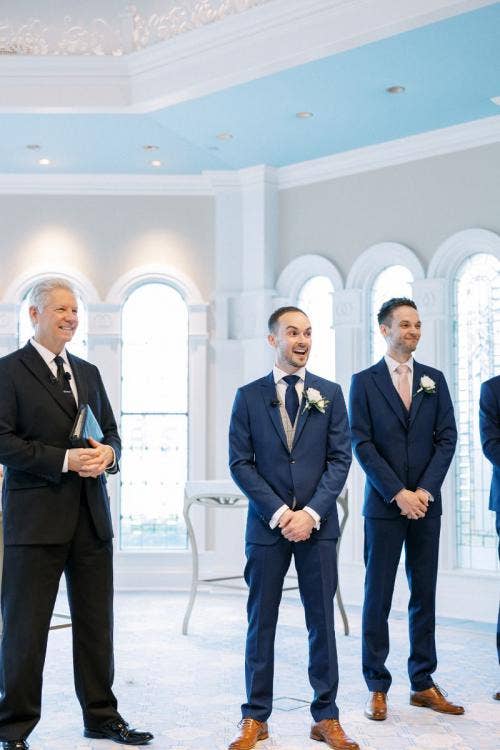 groom, candid, wedding ceremony, ceremony, Disney's wedding pavilion, wedding pavilion, bride entrance