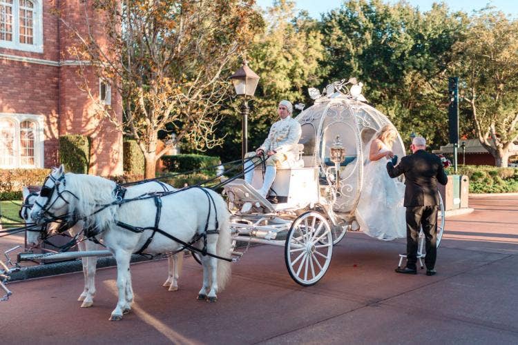 bride, entrance, bridal entrance, wedding ceremony, ceremony, ceremony entrance, coach, cinderella coach, Epcot, uk, uk pavilion, uk courtyard