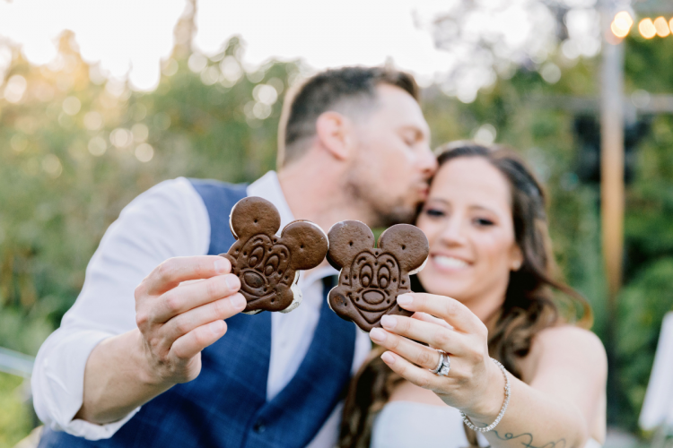 bride and groom, reception, vow renewal, vow renewal reception, mickey bar, ice cream, mickey ice cream, mickey ice cream bar, adventure lawn, disneyland, disneyland hotel