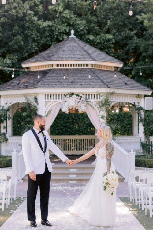 bride and groom, couple, portrait, couple portrait, wedding ceremony, ceremony, rose court, rose court garden, Disneyland, Disneyland Hotel