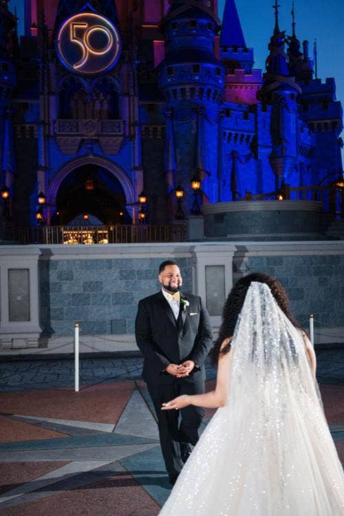 bride and groom, couple, first look, walt disney world, magic kingdom, cinderella's castle