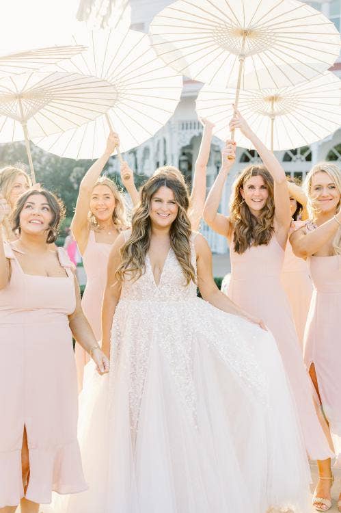 bride, bridesmaids, summerhouse patio, wedding reception, grand floridian, parasols