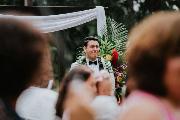 groom, candid, wedding ceremony, ceremony, entrance, bridal entrance, bride entrance, altar area, altar floral, aulani, halawai lawn, halawai lawn ceremony