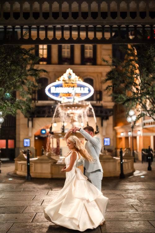 bride and groom, couple, portrait, couple portrait, twirl, Epcot, France, France Pavilion, Remy