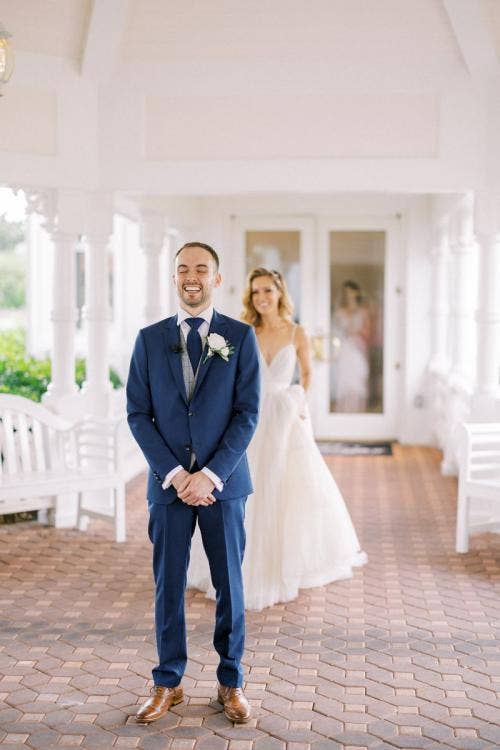 bride and groom, couple, first touch, wedding ceremony, ceremony, Disney's wedding pavilion, wedding pavilion