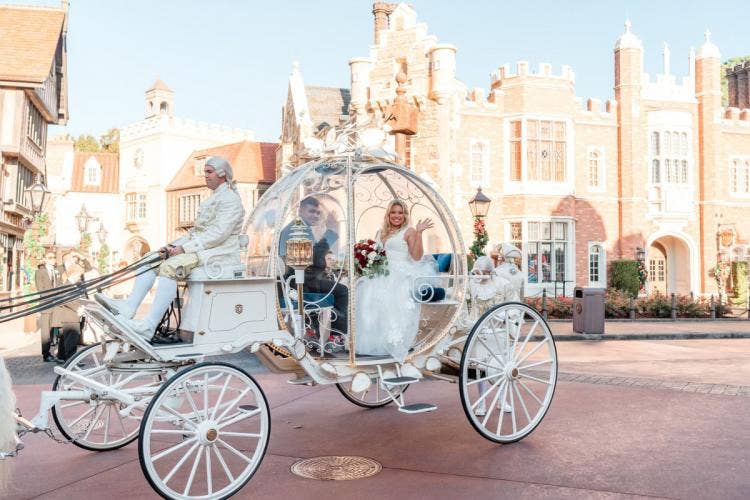 bride and groom, couple, portrait, couple portrait, staged exit, cinderella coach, coach, Epcot, uk, uk pavilion