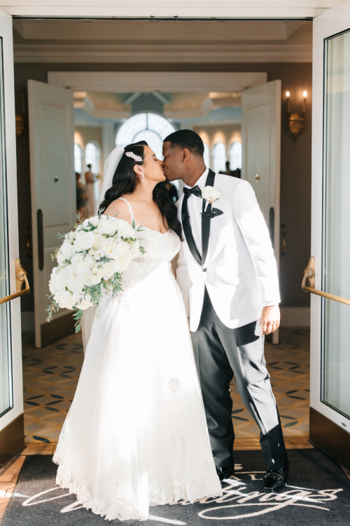 bride and groom, couple, exit, wedding ceremony, ceremony, kiss, Disney's wedding pavilion, wedding pavilion