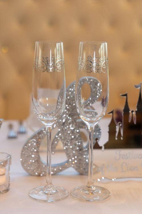 wedding reception, reception, glasses, toasting glasses, champagne glasses, sweetheart table, reception decor