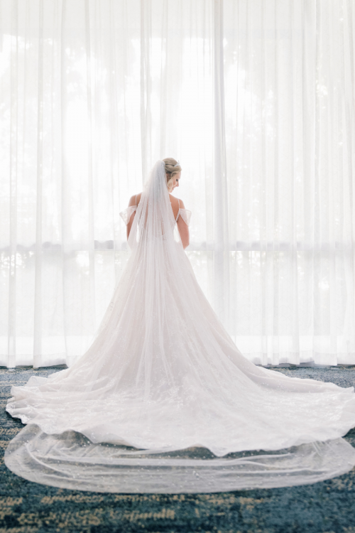 bride, getting ready, bridal portrait, veil, dress, wedding dress, disneyland hotel, disneyland, hotel, wedding day, wedding ceremony