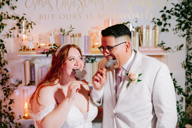 couple, portrait, disney snack, food, mickey ice cream bar, mickey ice cream, mickey bar, Disneyland Hotel, sleeping beauty pavilion