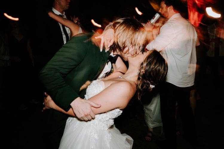 bride and groom, couple, kiss, wedding reception, reception, Disney's animal kingdom, animal kingdom