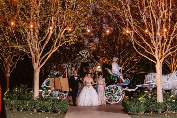 bride, wedding ceremony, ceremony, entrance, ceremony entrance, coach, crystal coach, father of the bride, mother of the bride, rose court, rose court garden, Disneyland, Disneyland Hotel