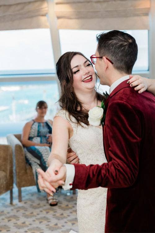 bride and groom, couple, first dance, wedding reception, reception, cake and champagne, celebration, wedding celebration, candid, dance, disney cruise line, cruise line, cruise, disney cruise, disney dream