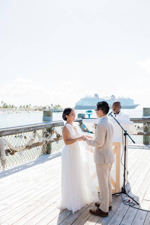 couple, exchanging vows, vows, wedding ceremony, ceremony, castaway cay, the wedding pointe, Disney Cruise Line, cruise wedding
