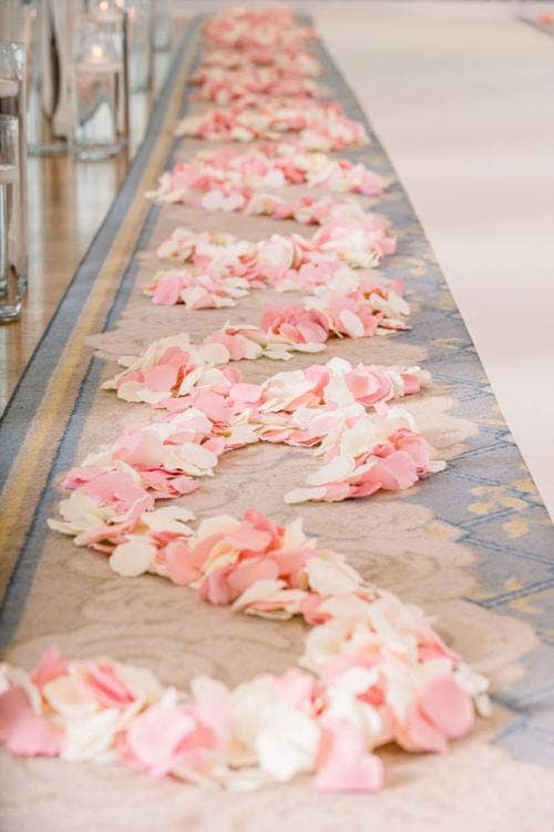 wedding ceremony, ceremony, ceremony decor, ceremony floral, aisle floral, custom aisle floral, pink floral, pink petals, petal toss, wedding pavilion, disney's wedding pavilion