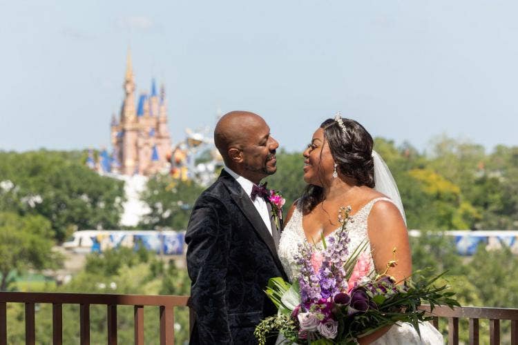 bride and groom, couple, portrait, couple portrait, contemporary, contemporary resort, california grill, cinderella's castle, bridal bouquet