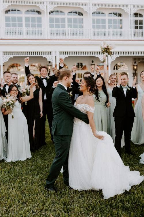 couple, portrait, bridal party, bridesmaids, groomsmen, bride and groom, grand Floridian, Disney's grand Floridian resort