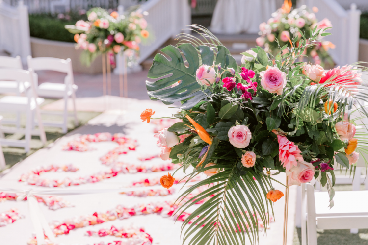 tropical flowers, tropical wedding, wedding ceremony, wedding ceremony decor, floral aisle runner