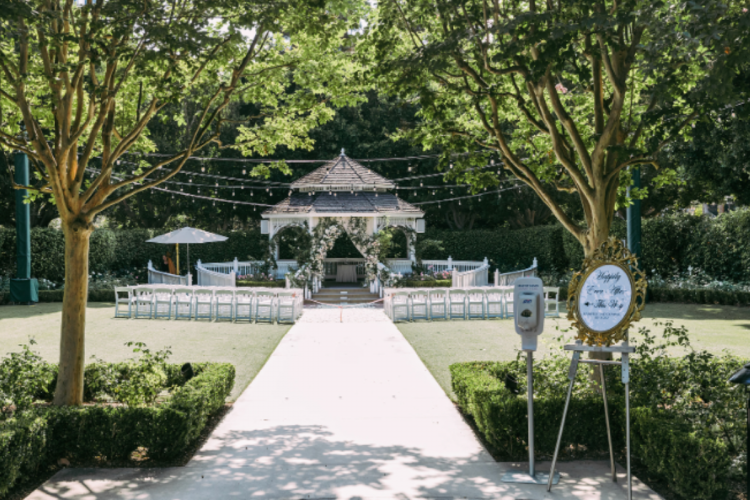 wedding ceremony, ceremony, venue, venue shot, decorated venue, decorated venue shot, rose court, rose court garden, disneyland, disneyland hotel, pink floral, pink roses, altar floral, altar, altar decor