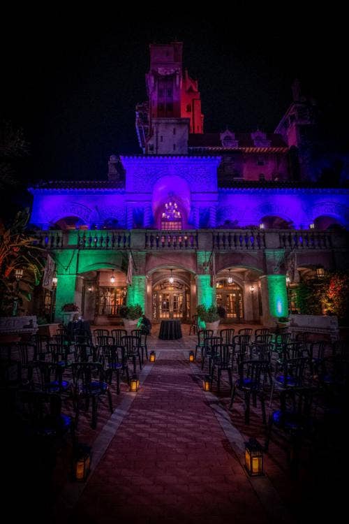 wedding ceremony, ceremony, ceremony decor, lanterns, custom chairs, custom up lighting, up lighting, hollywood studios, tower of terror