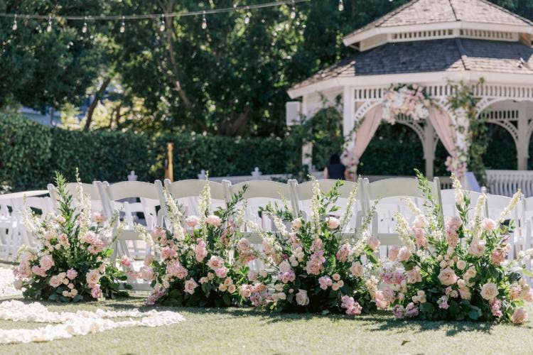wedding ceremony, ceremony, aisle decor, aisle floral, boho floral, pink floral, pink boho floral, Disneyland, Disneyland Hotel, rose court, rose court garden