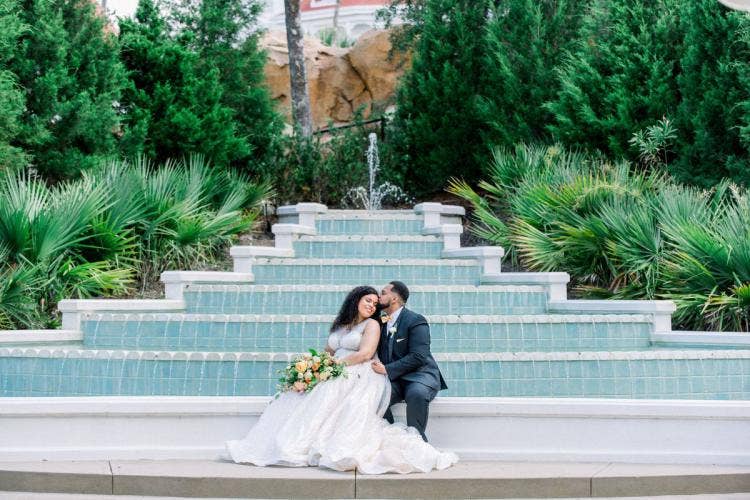 bride and groom, couple, portrait, couple portrait, grand floridian, grand floridian resort, fountain, grand floridian fountain