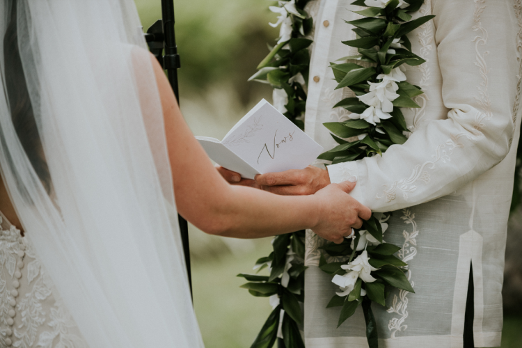 bride and groom, couple, wedding ceremony, ceremony, vows, sharing vows, vow book, lei, aulani, aulani wedding, hawaii, hawaiian wedding