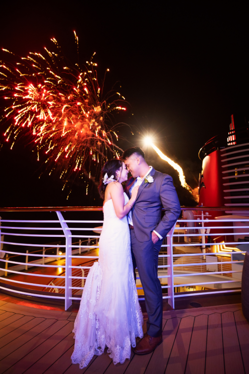 bride and groom, couple, wedding reception, reception, disney cruise line, cruise line, cruise, disney cruise, disney dream, disney dream wedding, fireworks, reception fireworks