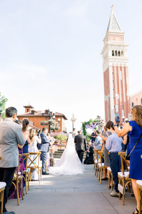 bride, bride and father, wedding ceremony, ceremony, ceremony with people, candid, walking down aisle, epcot, italy, italy pavilion, italy plaza