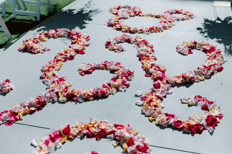 hidden mickey, flower petals, wedding ceremony, wedding ceremony decor, tropical, tropical flowers, aisle runner, custom aisle runner, floral aisle runner