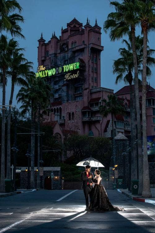 bride and groom, couple, portrait, couple portrait, hollywood studios, tower of terror, nighttime, halloween, black dress, black wedding dress