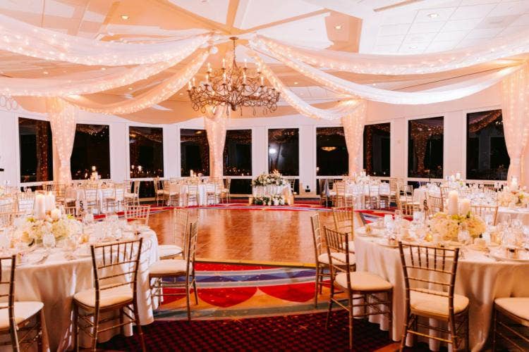 wedding reception, reception, decorated wedding reception, sleeping beauty pavilion, Disneyland, Disneyland Hotel, string lights, custom lighting, custom chairs, custom table, table decor, reception decor