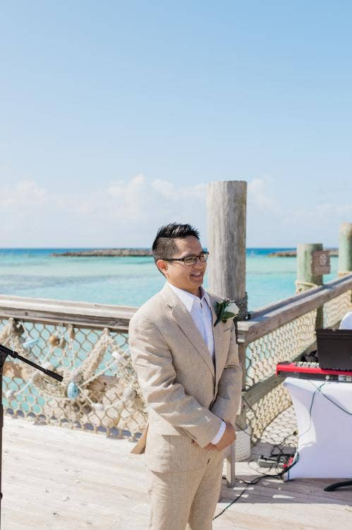 groom, candid, wedding ceremony, ceremony, castaway cay, castaway, the wedding pointe, Disney Cruise Line, cruise wedding