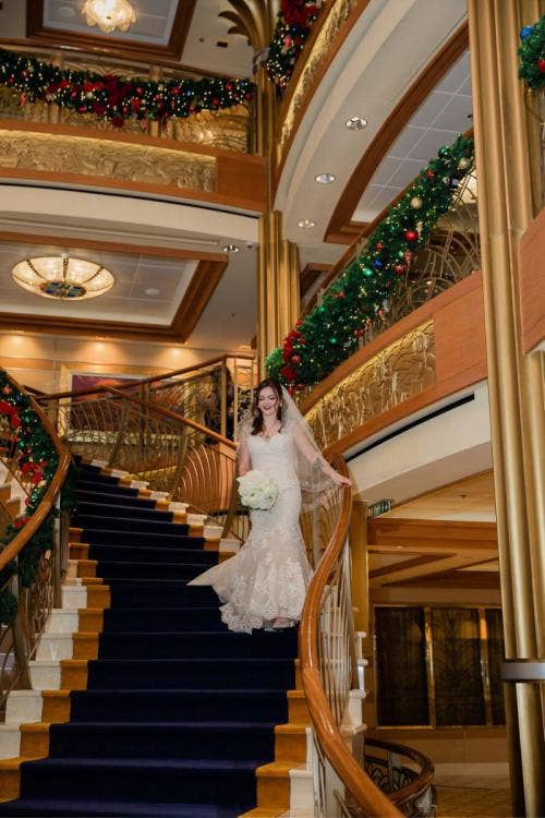 bride, entrance, bridal entrance, wedding ceremony, ceremony entrance, ceremony, disney cruise line, cruise line, cruise, disney cruise, disney dream, atrium, christmas, christmas decor, christmas wedding