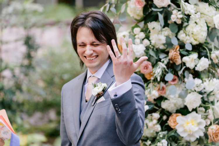 bride and groom, couple, wedding ceremony, ceremony, bride and groom at wedding ceremony, couple at wedding ceremony, rings, exchanging rings, couple exchanging rings, brisa courtyard, grand californian
