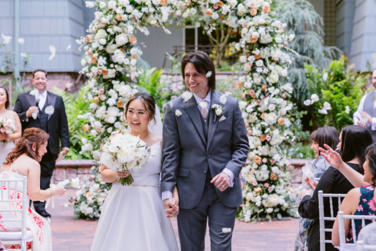 bride and groom, couple, wedding ceremony, ceremony, exit, petal toss, petal toss exit, altar area, altar floral, altar decor, ceremony floral, candid, brisa courtyard, grand californian