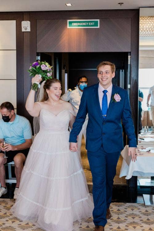 bride and groom, couple, entrance, reception entrance, celebration, reception celebration, cake and champagne, Disney cruise line, cruise line, cruise, overlook